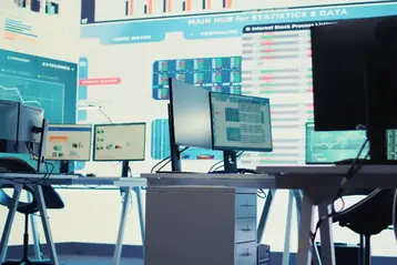 Empty enterprise control room with large monitors
